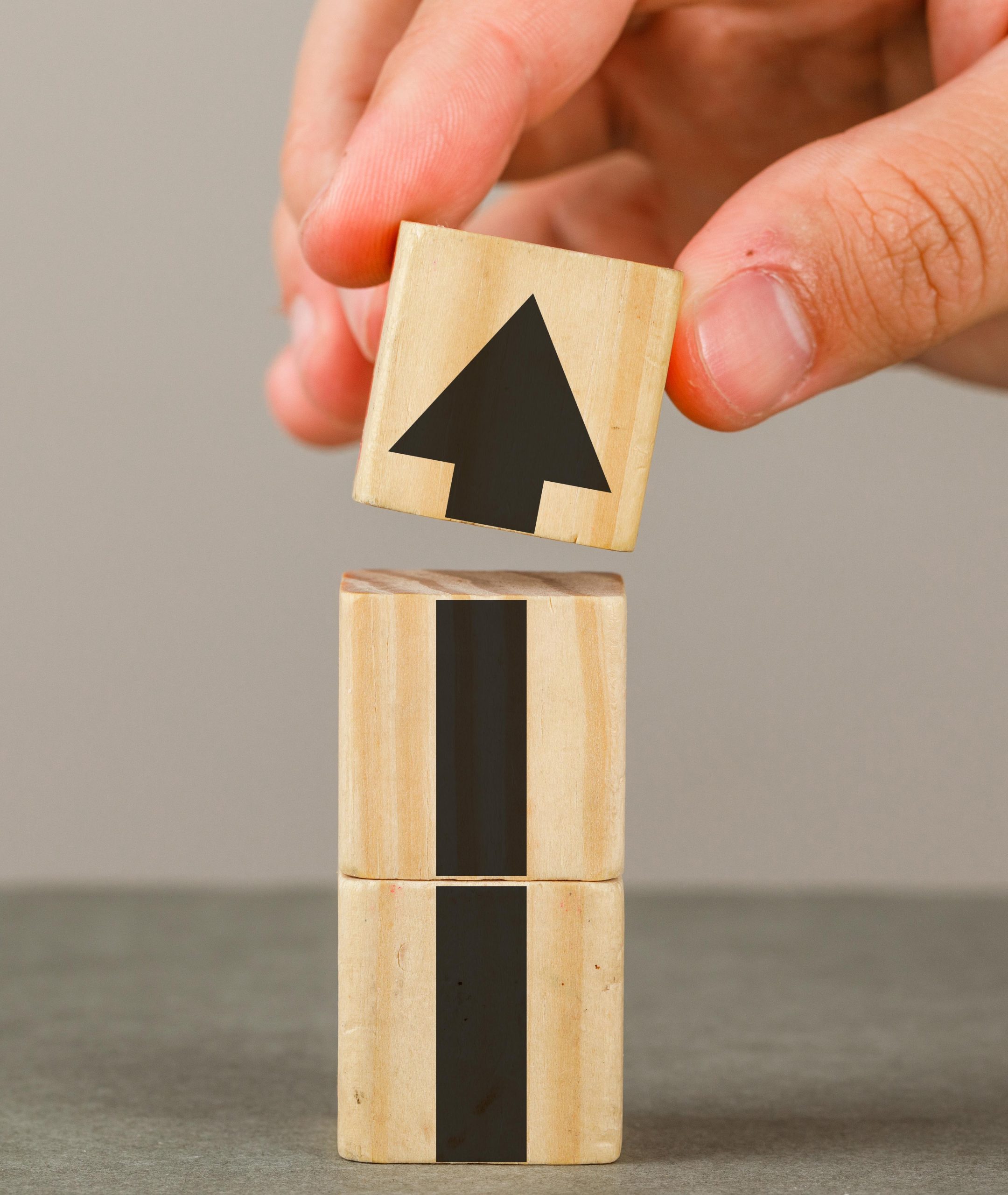 Business growth concept on grey and white background side view.